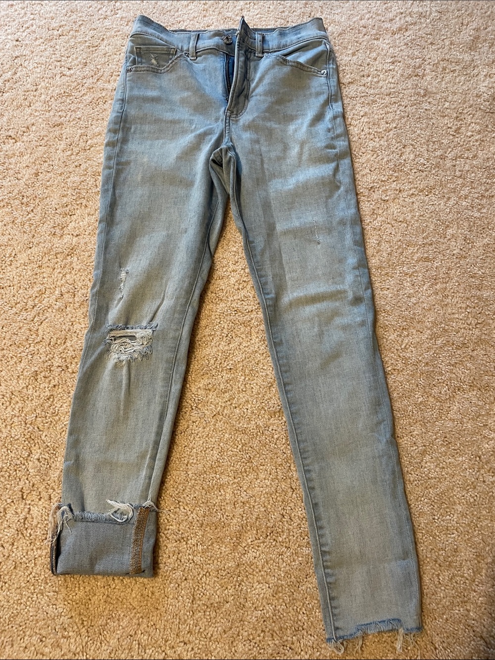 Express Women's Light Blue Skinny Jeans with Knee Distress